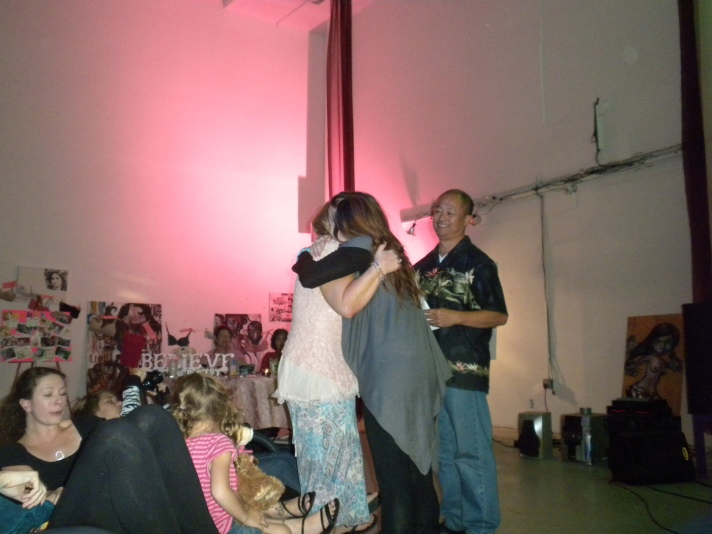 SABRINA TAYLOR hugging a survivor, ARTISTS UNITED LIVE 10*10*09  ~ AWARENESS